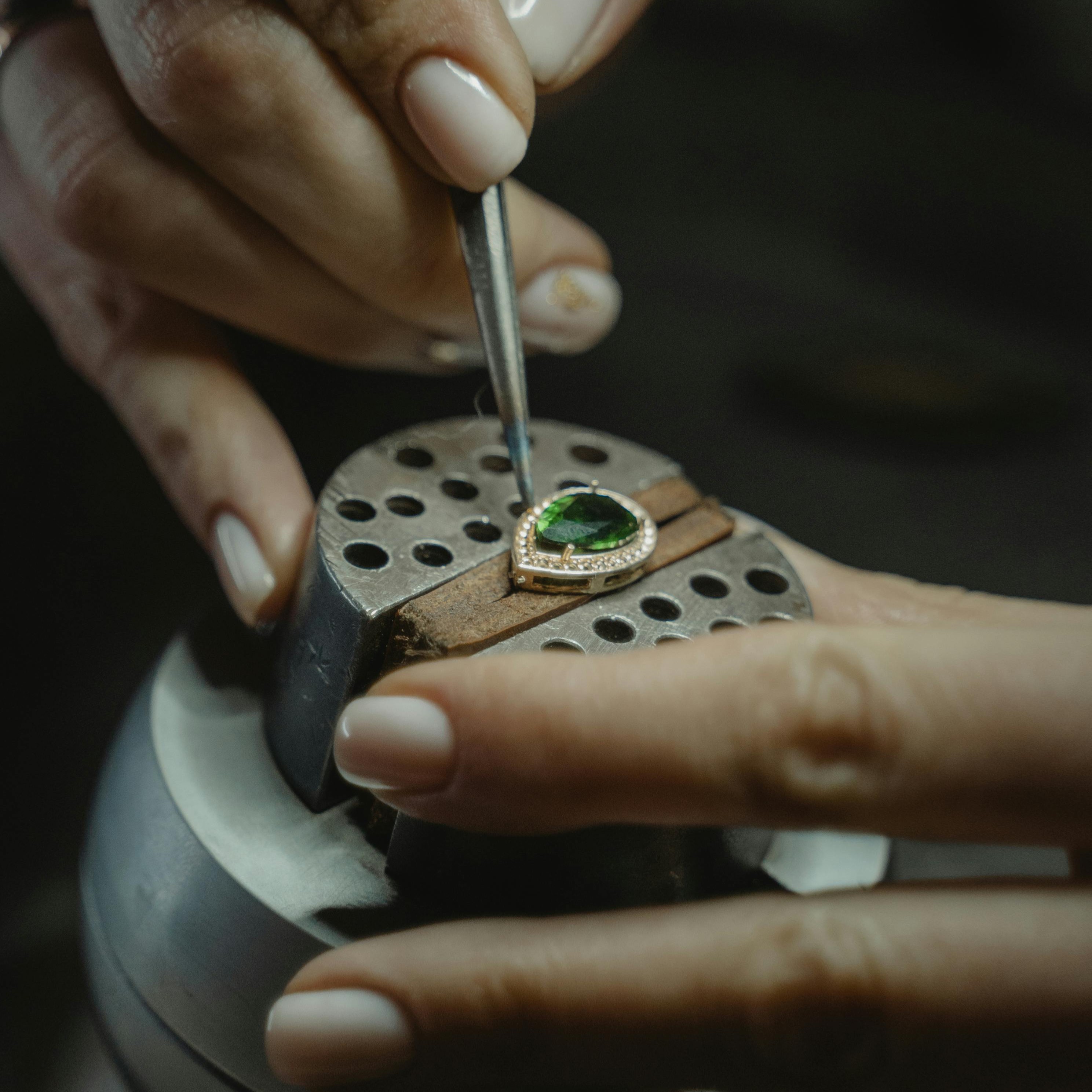 Emerald necklace being made.
